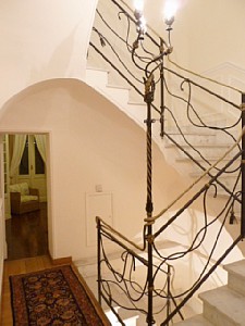 The elegant stairwell of the villa